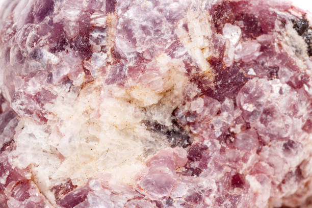 istock Macro mineral stone Lepidolite in the rock a white background 1054261426