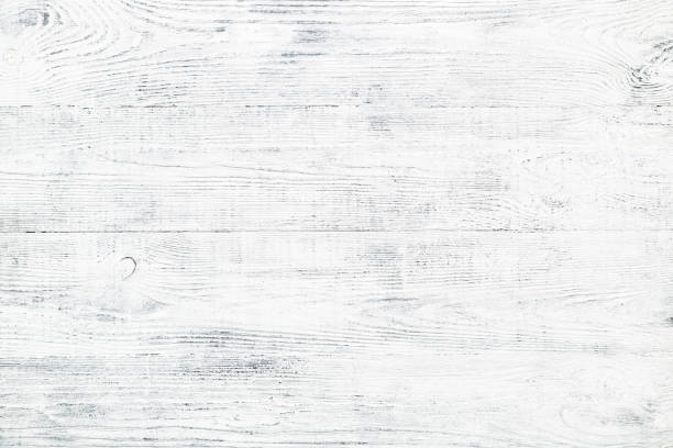 Old wooden plank texture with cracks and scratches White & gray vintage board. Old wooden plank texture. Shabby chic faded wood background with cracks and scratches. White & gray painted vintage board. wood paneling photos stock pictures, royalty-free photos & images
