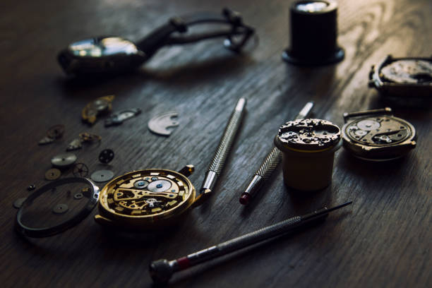 istock Watchmaker is repairing the mechanical watches in his workshop 1054269620
