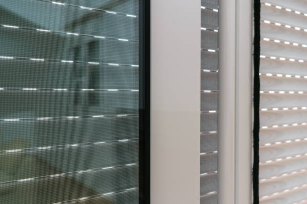 istock Aluminum sliding door with fly screen and rolling shutter detail 1054270208