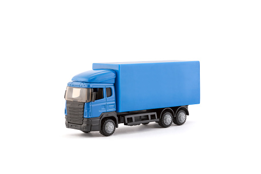 Blue truck miniature on white background