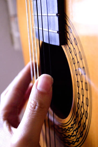 istock Part of musical instrument with strings. Spanish guitar 1054289188