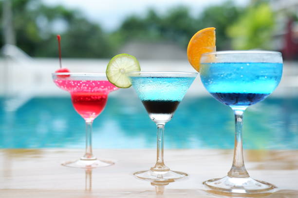 istock summer cocktails at swimming pool 1054290210