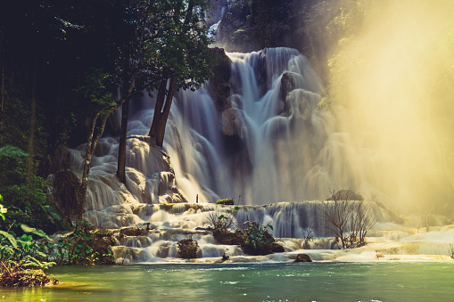 Kuang Si falls are located approximately 30km south of Luang Prabang, Laos, Southeast Asia.  These stunning marvels of nature cascade through the rainforest and have carved the landscape over centuries.