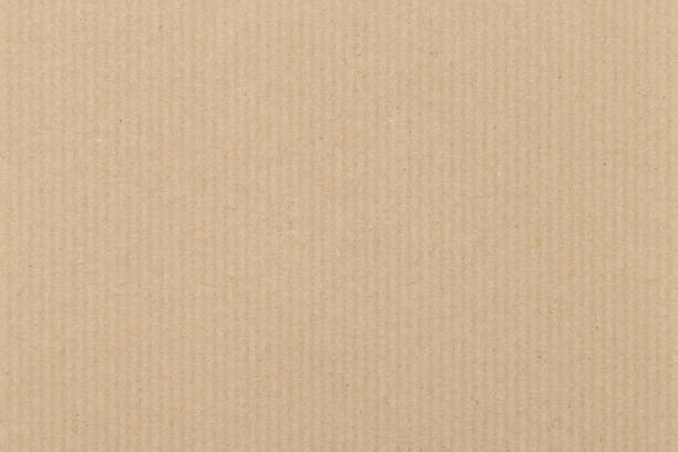 brązowe tło tekstury tektury falistej - paper brown paper textured striped zdjęcia i obrazy z banku zdjęć