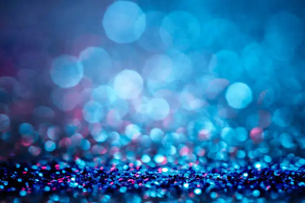 Photo of Glitter defocused lights blue background