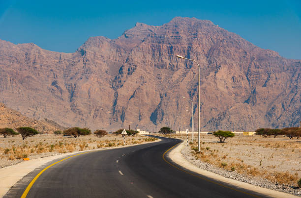 istock Scenic desert road in Musandam Oman 1054312238