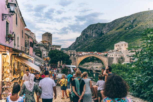 Mostar Tourists in Mostar, Bosnia Herzegovina stari most mostar stock pictures, royalty-free photos & images