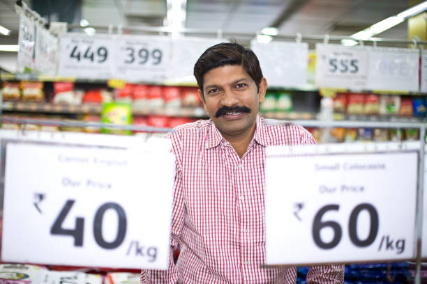 Supermarket aisle with shelfs full of a variety of products