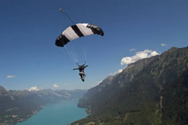 Photo of Paraglider glides through mid-air