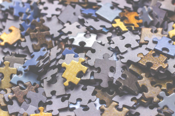 selektywne skupienie sztuk układanki, puzzle tle. - jigsaw puzzle puzzle business mirrored pattern zdjęcia i obrazy z banku zdjęć