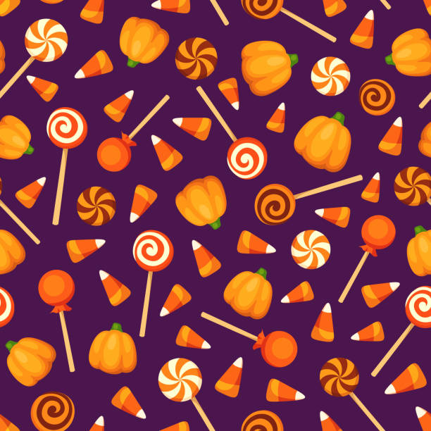 nahtlose hintergrund mit halloween süßigkeiten auf lila. vektor-illustration. - patterned halloween background stock-grafiken, -clipart, -cartoons und -symbole