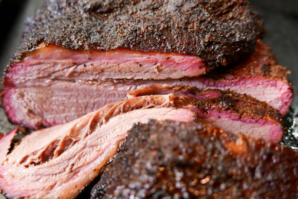 Sliced smoked brisket, close-up. Barbecue brisket brisket photos stock pictures, royalty-free photos & images