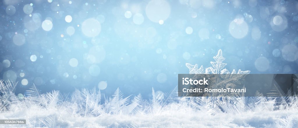Snowflake On Natural Snowdrift Close Up - Christmas And Winter Background Snowflake On Snow With Snowfall Backgrounds Stock Photo