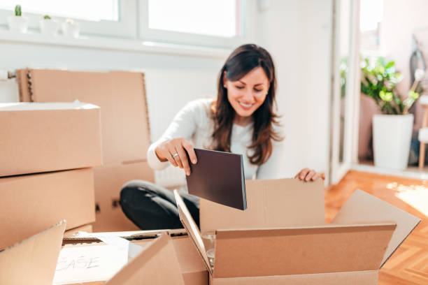 istock Unpacking at new home. 1054349830