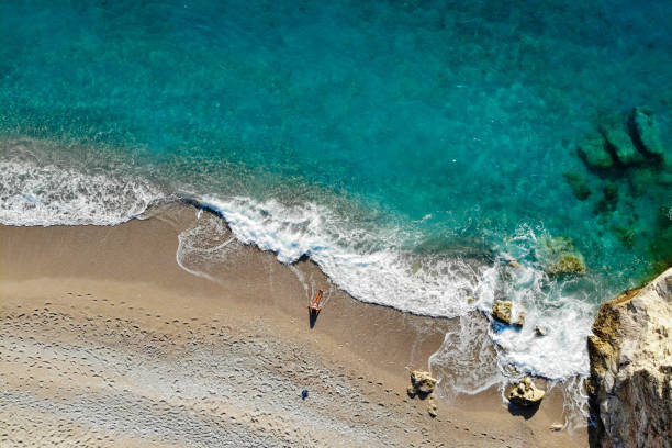 istock Women is enjoying the sea. 1054358638