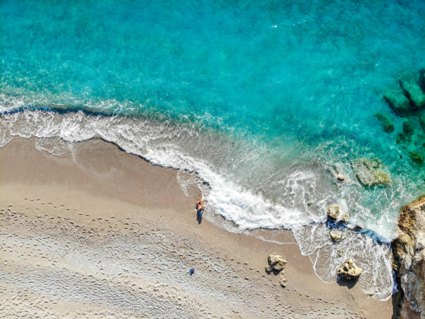 istock Women is enjoying the sea. 1054358834