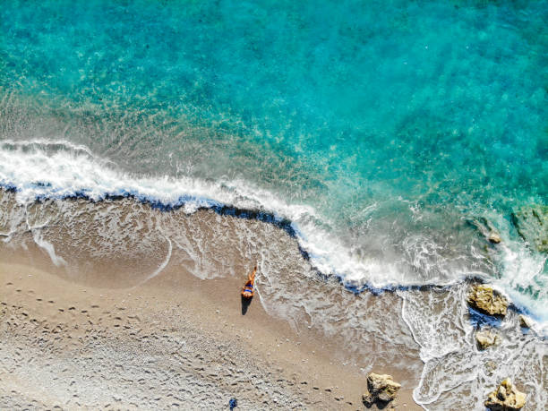 istock Women is enjoying the sea. 1054359000