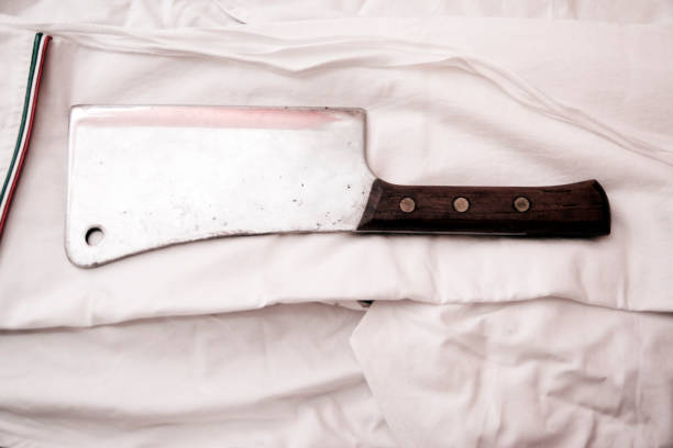 Butcher meat cleaver and clean suit