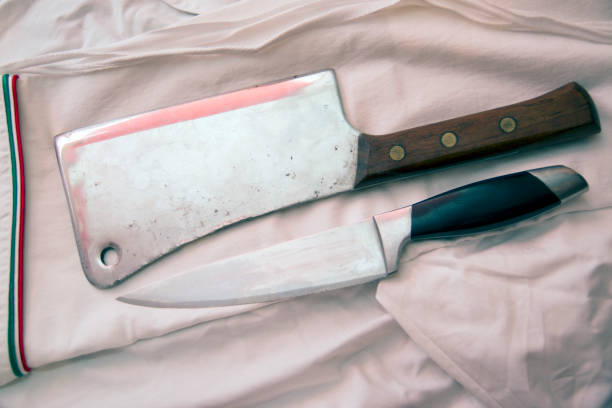 istock Butcher meat cleaver and chef knife 1054361310