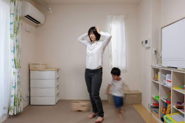 istock Irritated mother and naughty child 1054361948