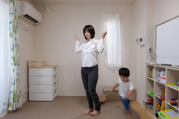 istock Irritated mother and naughty child 1054362994