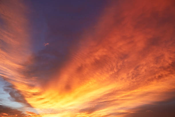 istock Dramatic Sky and Sun Rays Background. Sunbeams Light and Moody Cloudscape. Toned and Filtered Photo with Copy Space 1054369304