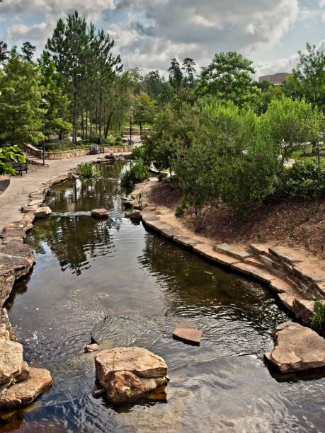 istock Walkway along a Stream in The Woodlands TX 1054370492