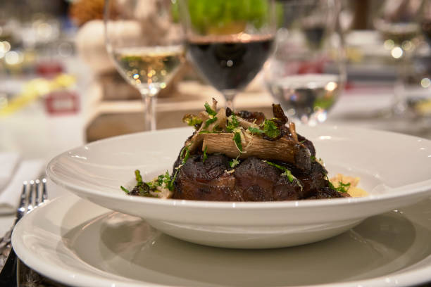 ossobuco dish ready to eat - steak plate gourmet beef imagens e fotografias de stock