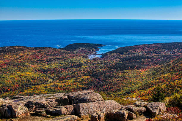 istock Autumn colors from Acadia NP with blue sky and Atlantic ocean 1054385910