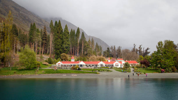 Queenstown, New Zealand: October 12, 2015: Walter Peak High Country Farm. The homestead is owned by Real Journeys and tourists sail across Lake Wakatipu on the Tss Earnslaw steam ship to visit the farm.
