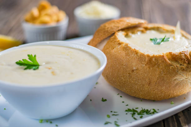 istock Homemade cheese cream soup, served in bread bowl 1054398086