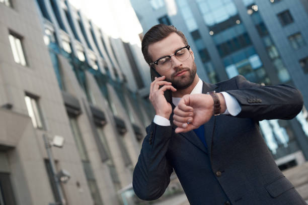 istock A young businessman in glasses and with a beard arranges a meeting 1054400604