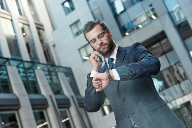 istock A young businessman in glasses and with a beard arranges a meeting 1054400624