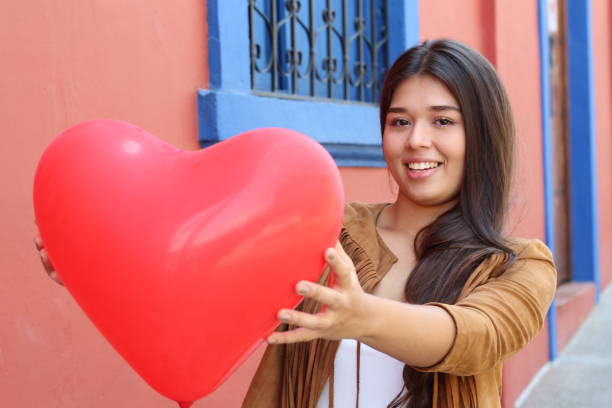 istock Young female holding a heart 1054400966