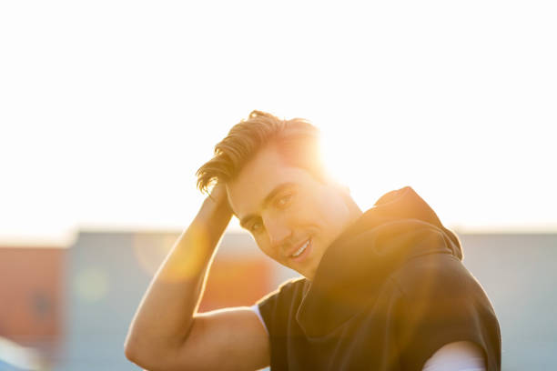 istock Young man exercising outdoors 1054401014