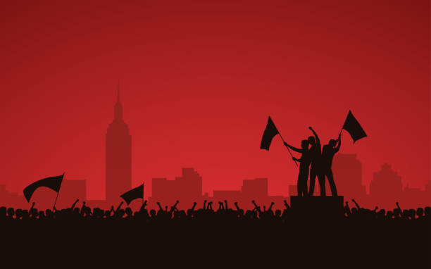 stockillustraties, clipart, cartoons en iconen met silhouet groep mensen verhoogd vuist en protest in de stad met rode kleur hemelachtergrond vlaggen - communism