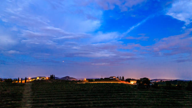 istock Evening in the vineyard of Rosazzo during a moon eclipse 1054405074