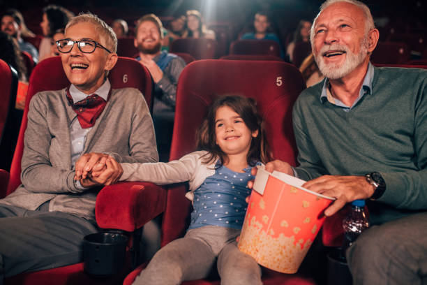 istock Happy family at cinema 1054416046