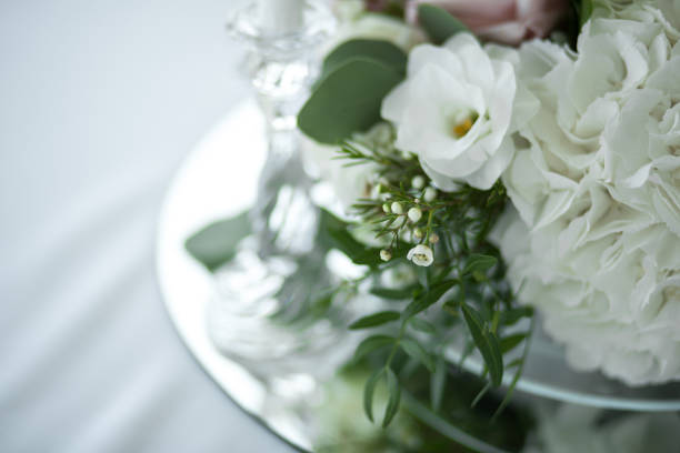 istock Closeup fresh white roses decoration table decoration. wedding decor 1054416084