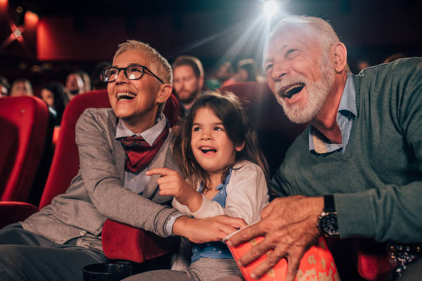 istock Smiling multi-generation family at cinema 1054416166