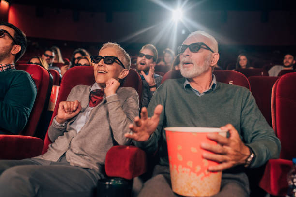 istock Joyful couple watching 3D movie 1054416240