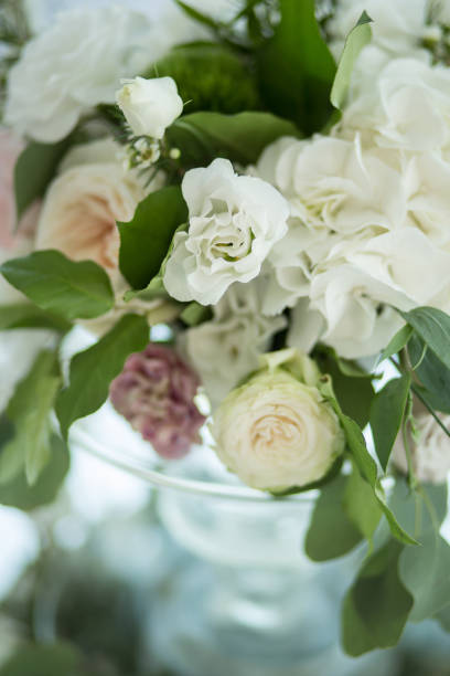 istock Closeup fresh white roses decoration table decoration. wedding decor 1054416250