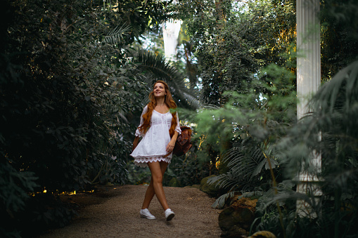 Young woman in tropical environment