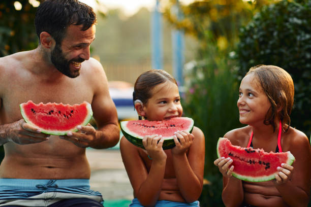 istock Watermelon Time Family 1054416396