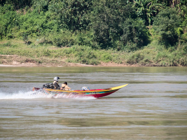 travel by speedboat - luang phabang laos thailand mekong river imagens e fotografias de stock