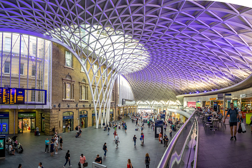 London, England - August 4, 2018: Interior of the Kings Cross Train Station in London. Kings Cross is one of London's most famous stations in part because of the Harry Potter movies.