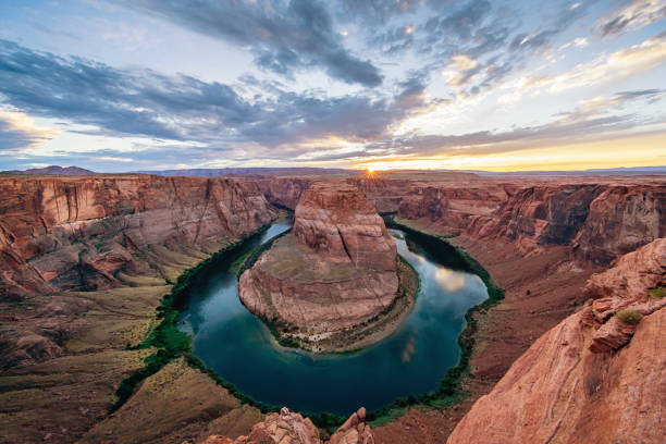 Sunset at Horseshoe Bend Page Arizona USA Sunset at scenic view over Arizona Horseshoe Bend - Horseshoe Canyon with Colorado River in Glen Canyon. Page, Arizona, USA. horseshoe bend river stock pictures, royalty-free photos & images
