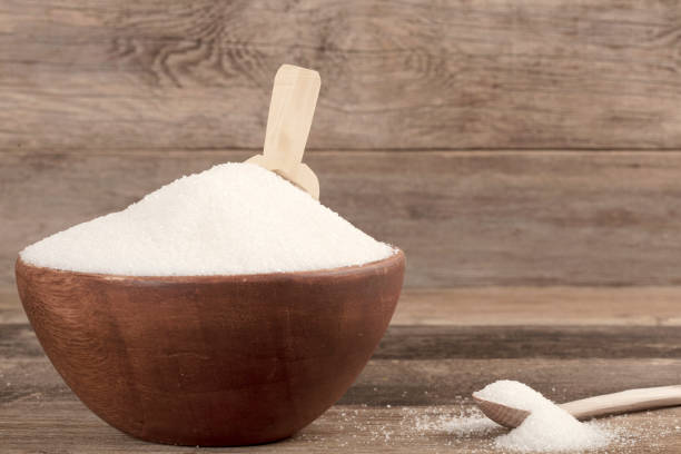 istock sugar bowl over wooden table 1054447014