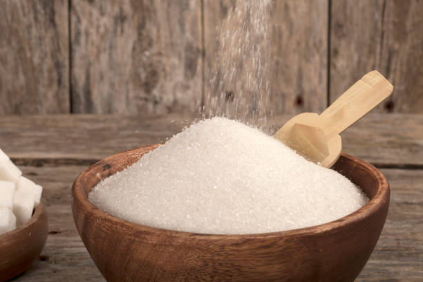 istock sugar bowl over wooden table 1054447254